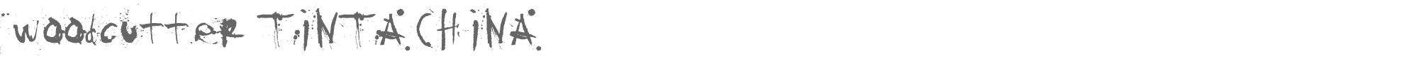 Sample characters Woodcutter Tinta China Font